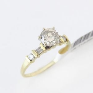 Diamond ring. I2 quality total ct wt .96